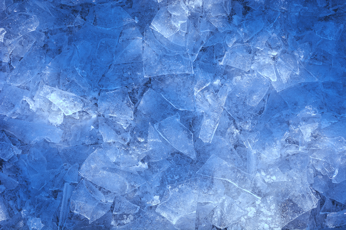 Broken ice on blue background